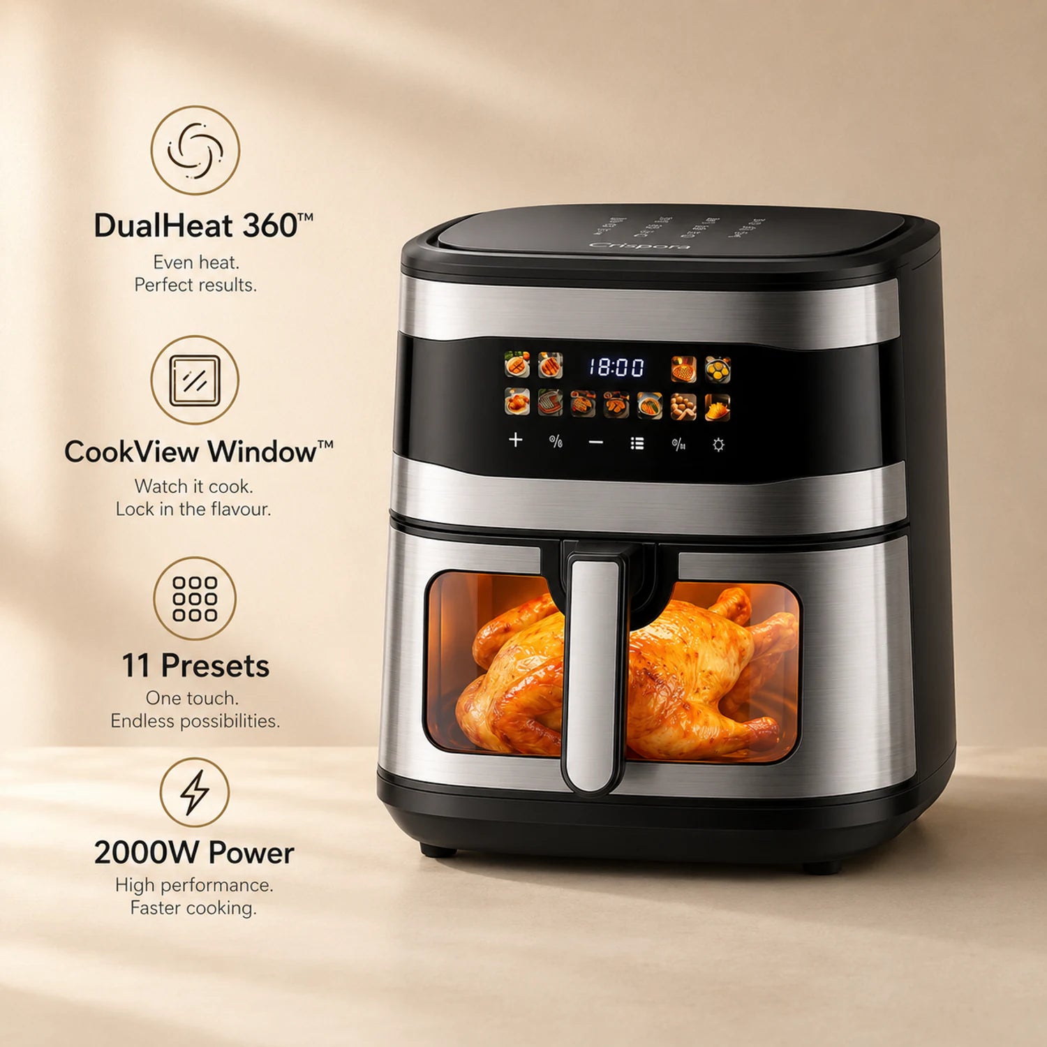 A countertop air fryer with a black and stainless steel body, featuring a digital display screen and a clear window showing cooked chicken inside. The image includes feature callouts on the left side against a warm beige background.